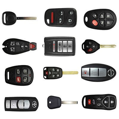 a selection of car key fobs, remotes, and remote head keys